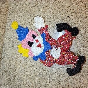 Vintage 70's melted plastic popcorn circus clown.